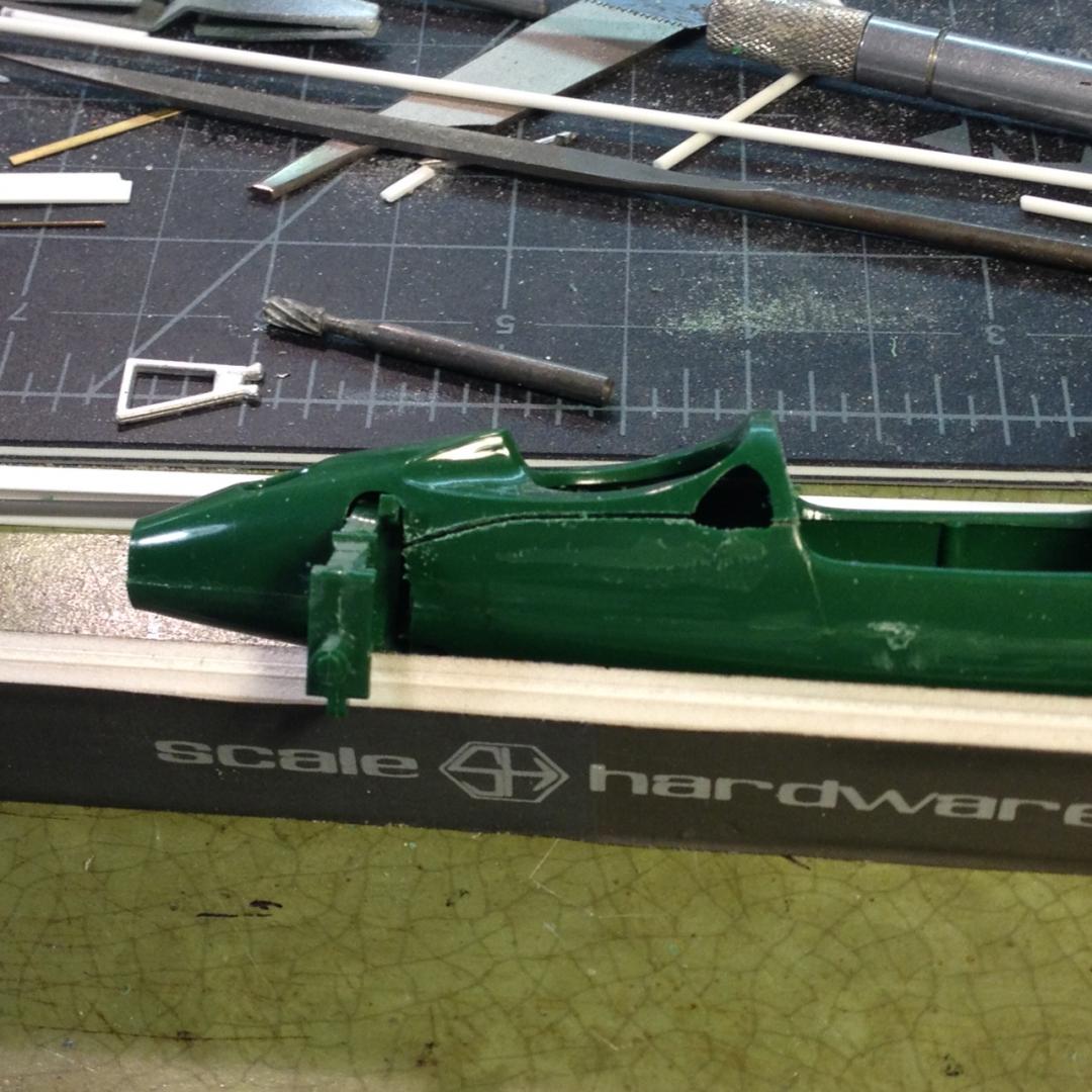 gonna want to use parts of the susp assembly - so  work begins cutting apart the shell along the proper lines.JPG