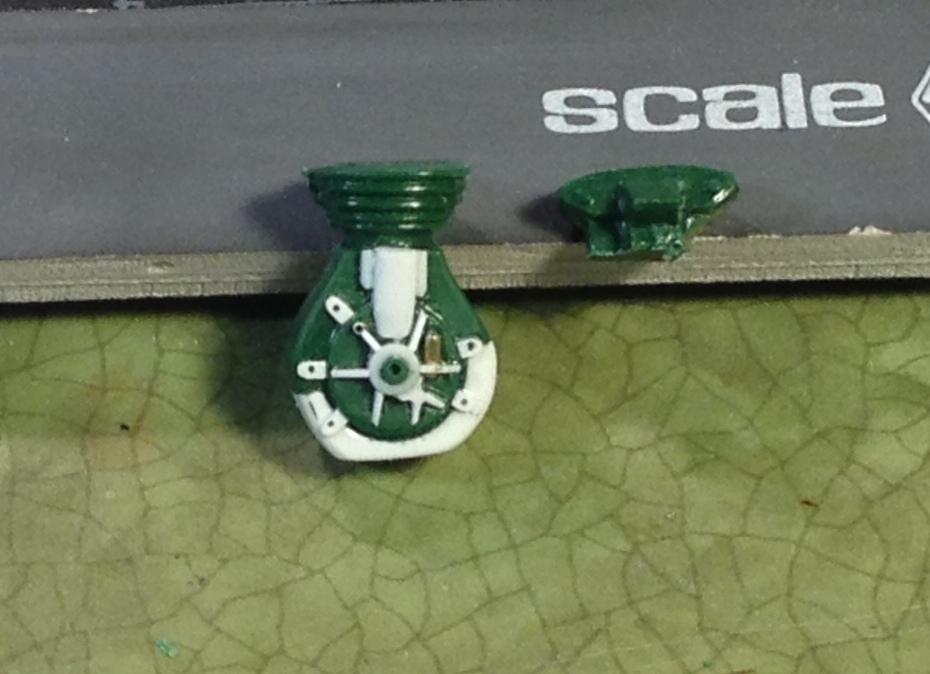 some more detail - including some structural webbing cast into the crankcase - added with bits and peices of evergreen strip - and the cyl head has been removed for some more detailing.JPG