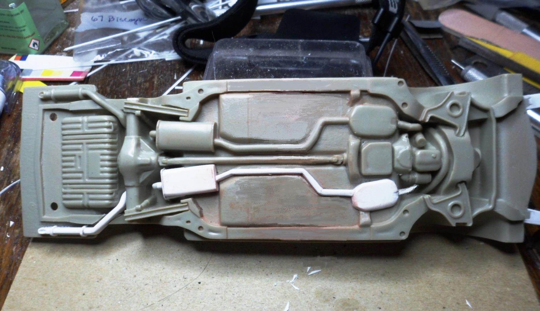 180327 - 77 LeMans-  Dual exhaust added to chassis (1).JPG