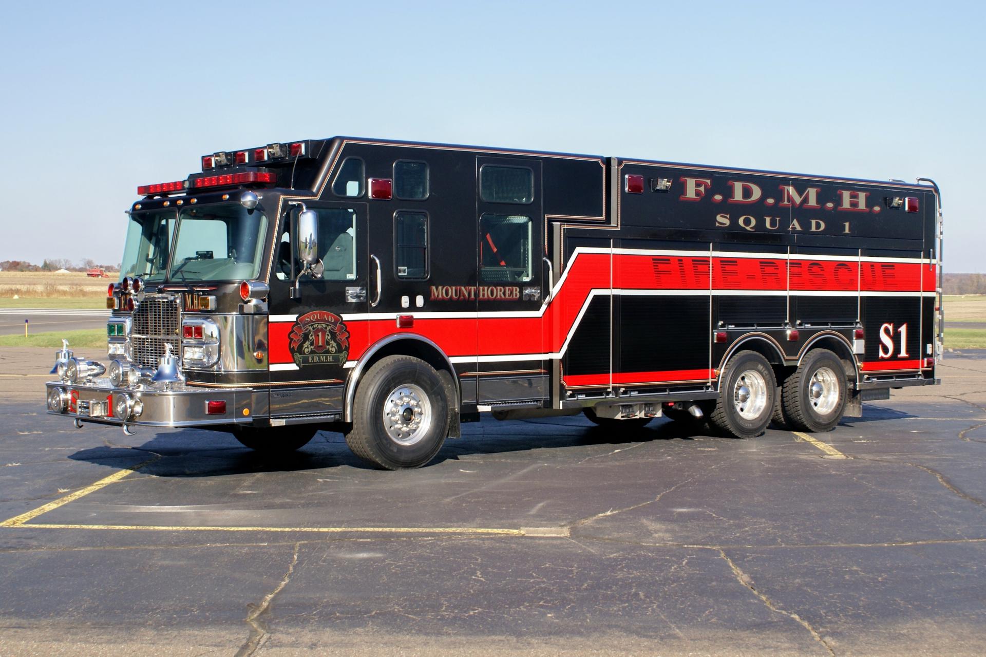 Squad 1  2006 SPARTAN GLADIATOR CUSTOM FIRE 2000 gpm 1000 gwt lft frt.jpg