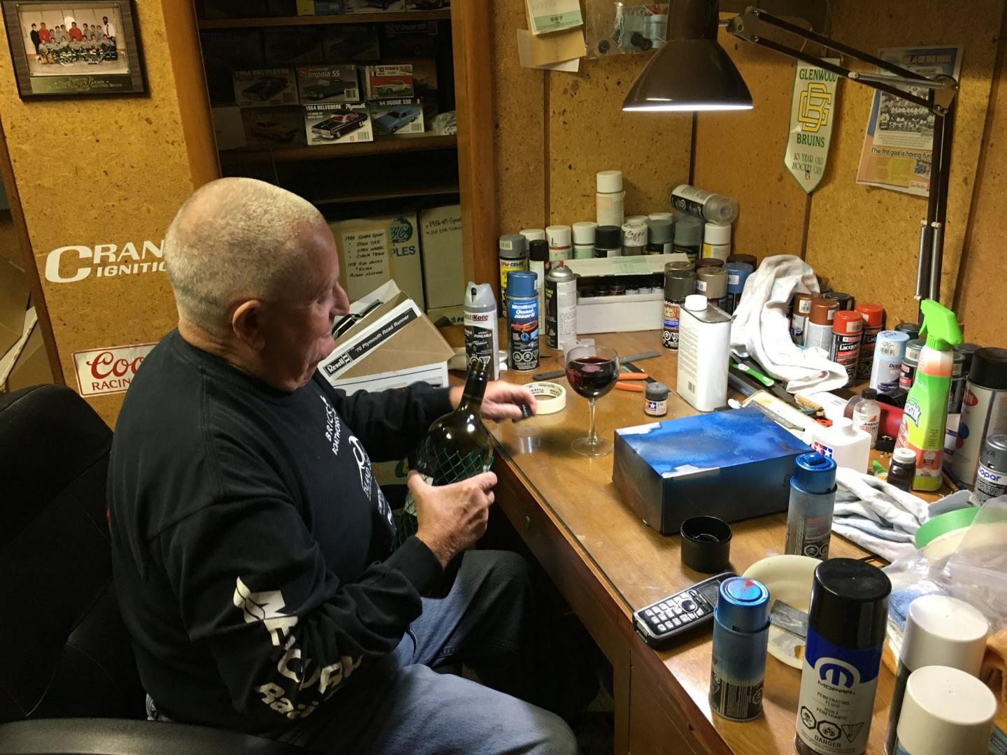 Wayne getting ready to enjoy some wine at the bench.jpg