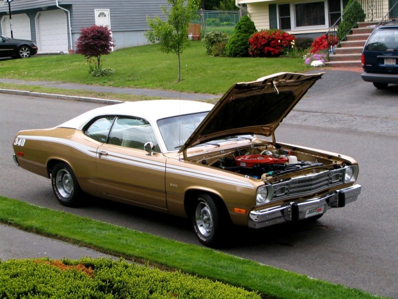 5b6f04f33afa0_Gold1973Duster340.jpg.59575f8dcb6317c326256a422e16be05.jpg