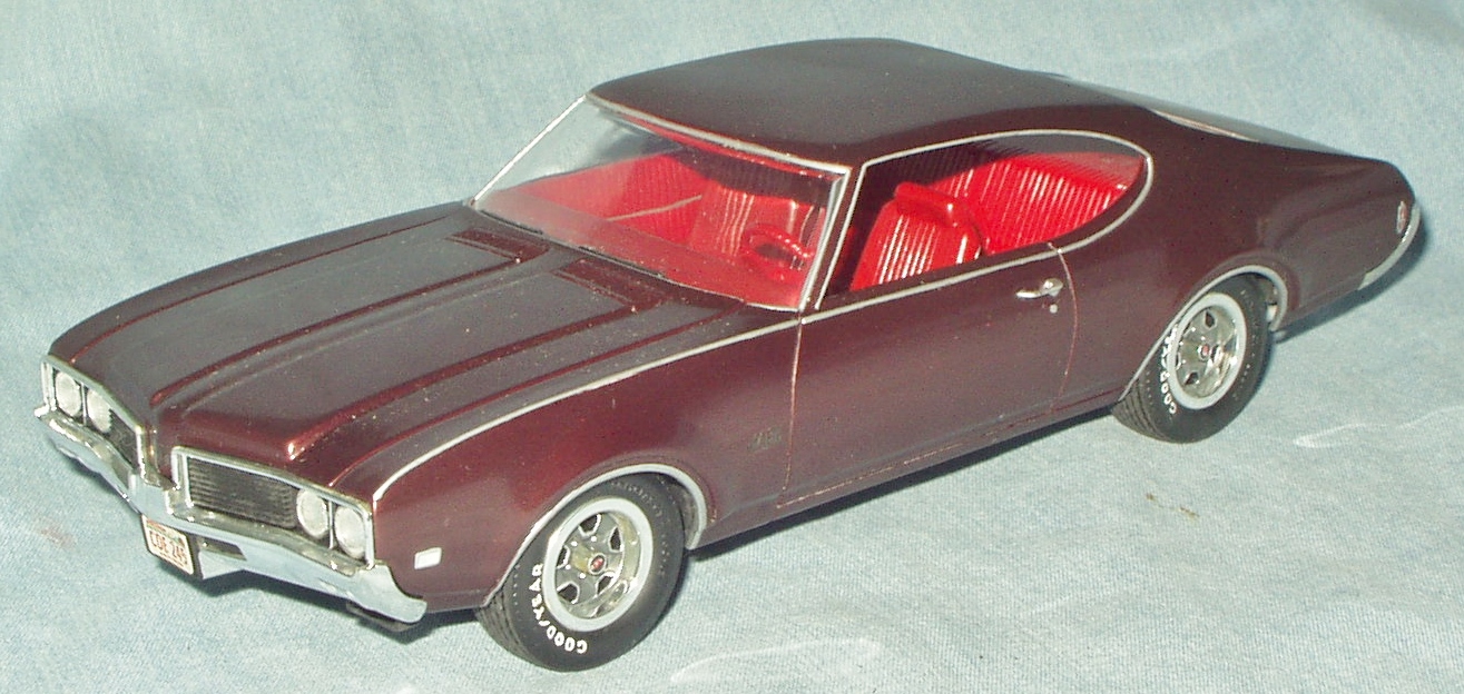 69Olds44202.jpg.2be2bd4cba45a7c05bbe2672a2fb9ef9.jpg