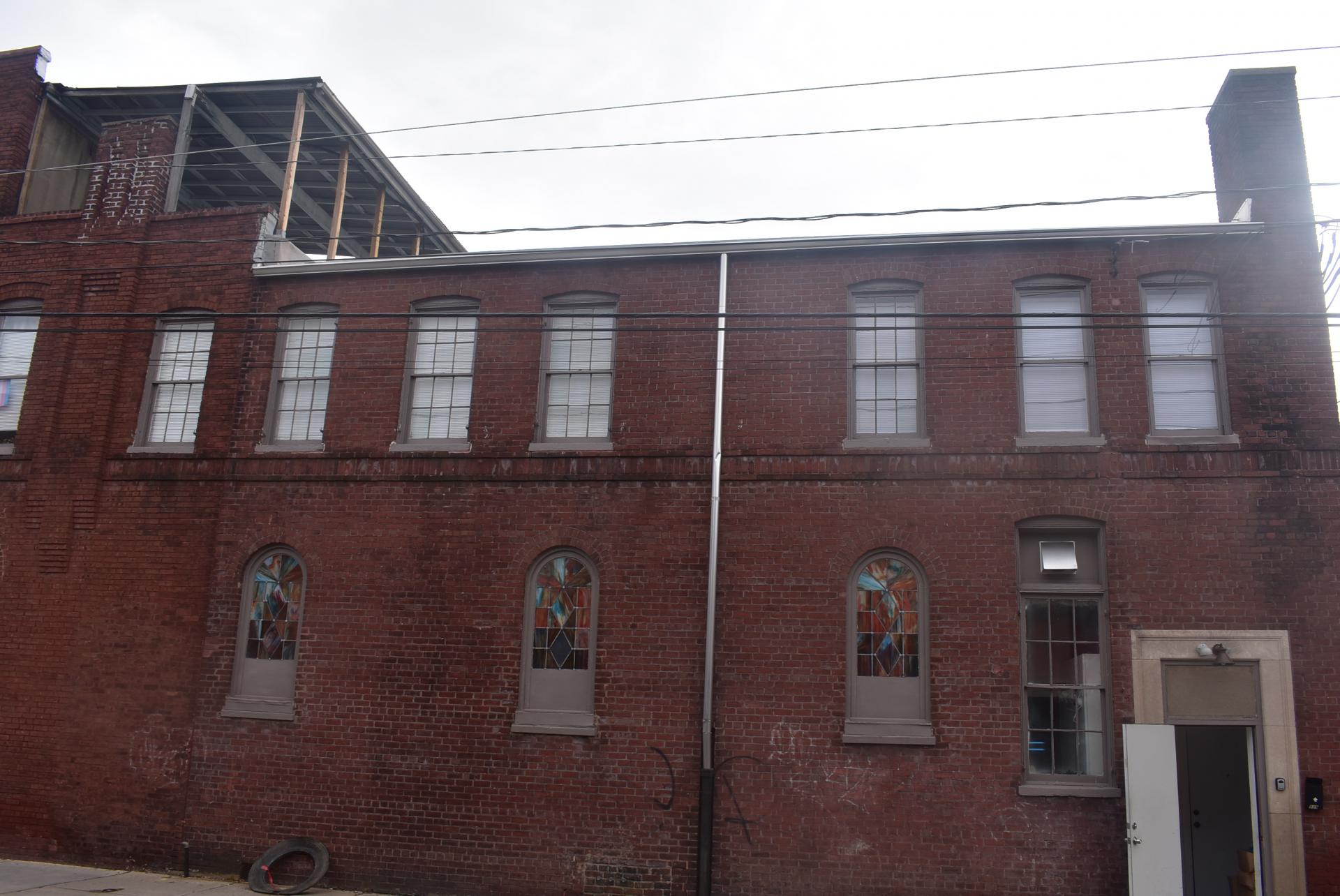 Harrisson st window details at back door of Village.JPG