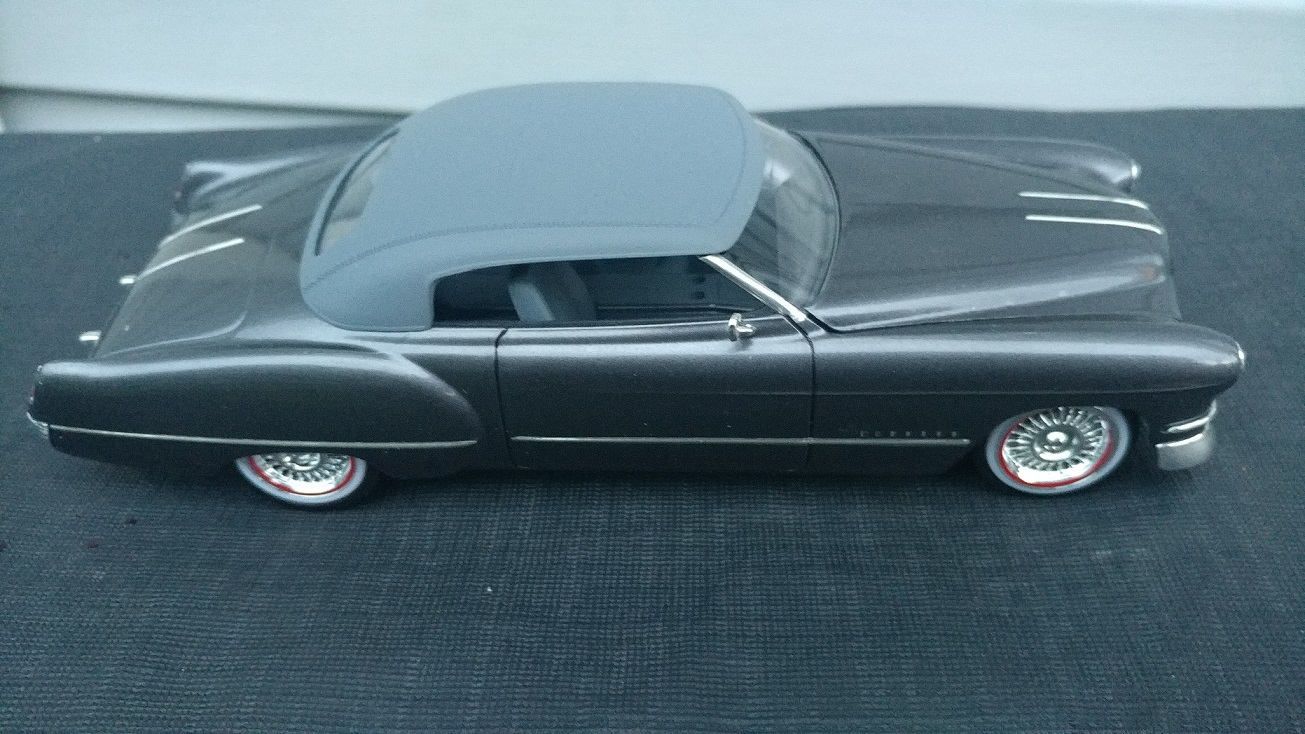 thanks Claude the top and interior are just Testors primer gray and the bod...