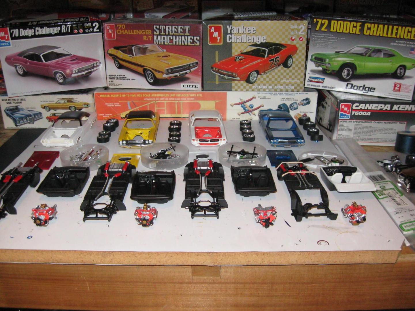 Four Dodge Challengers preassembly.JPG