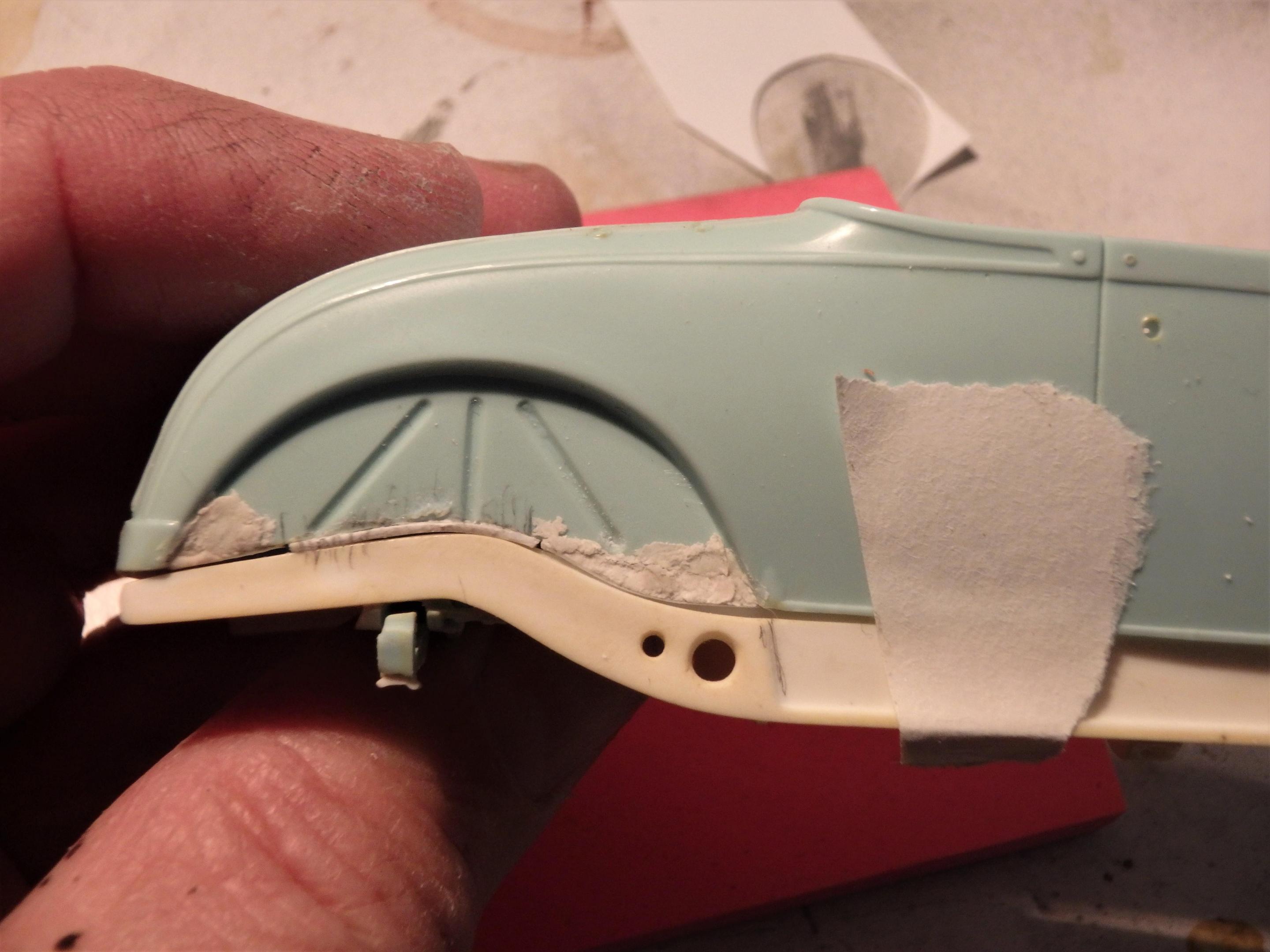 Body shell fender well.JPG