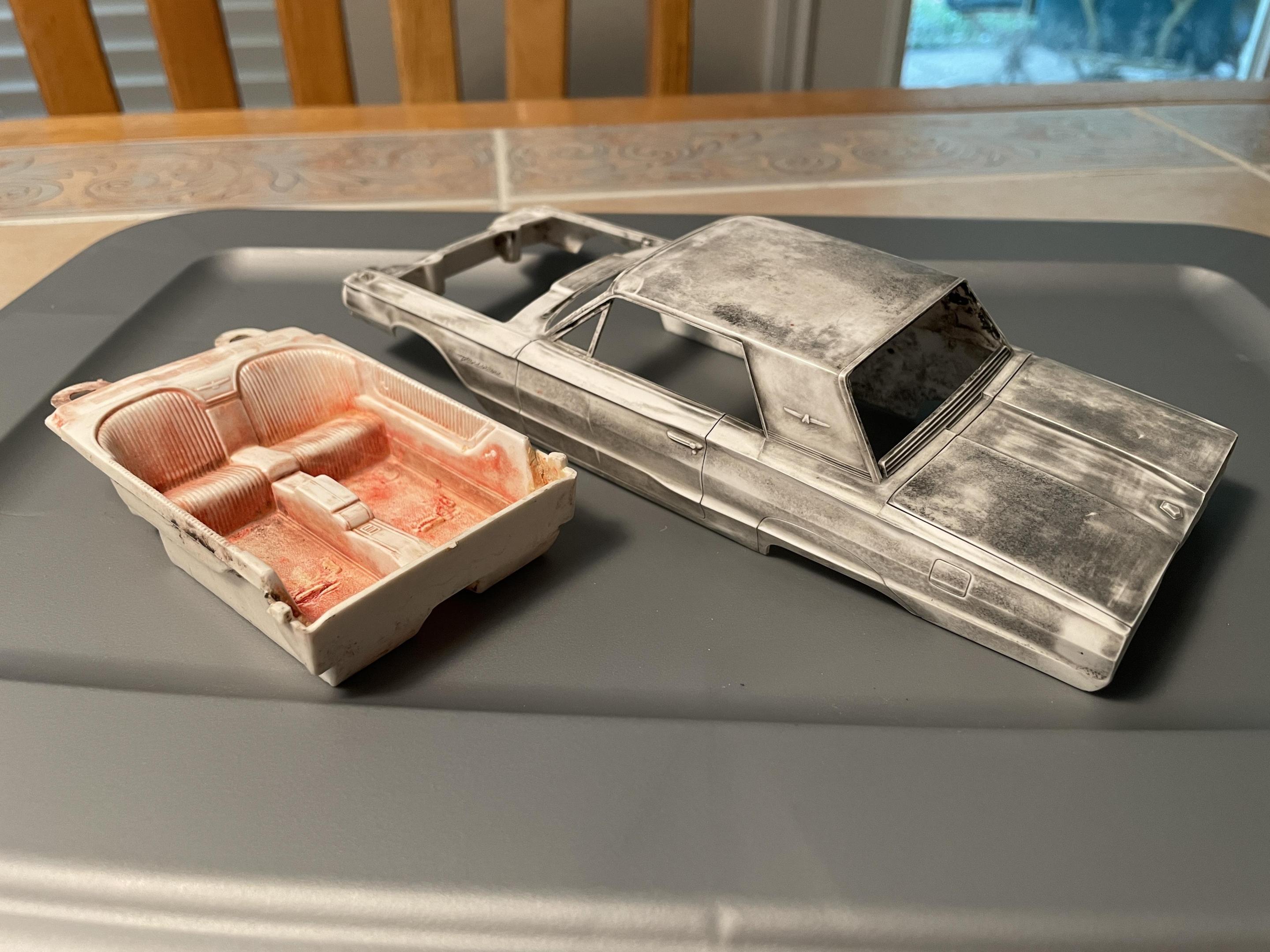 How to remove 60 year old brushed Testor's Black and Red enamel